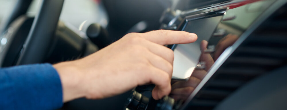 male hand touching car sensor panel, (speedalternators.com).