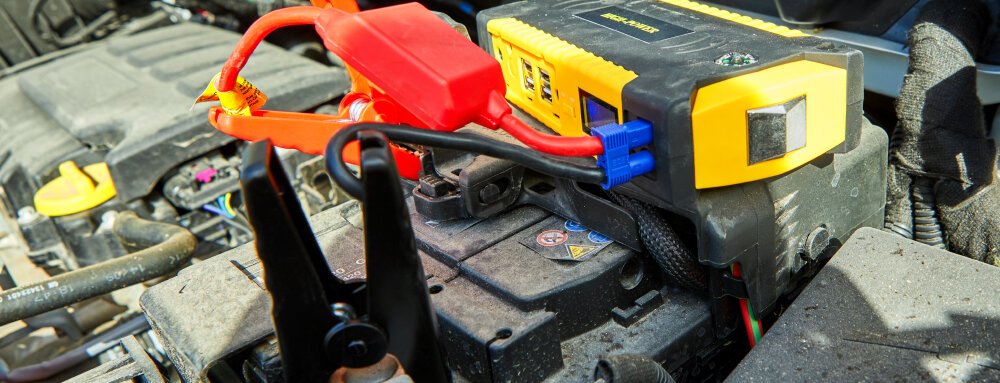 Clear image of automotive battery cables red positive black negative, (speedalternators.com).