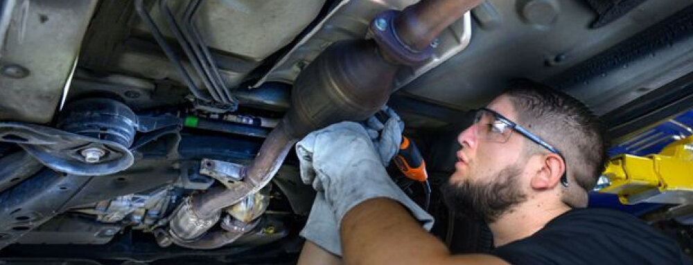 Car catalytic converter checked by a professional mechanic.